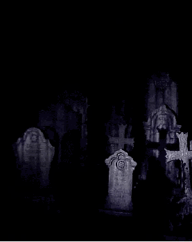 Ghostly images and spirits appear and disappear in the grave yard on a dark scary night