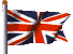 Picture of United Kingdom flag flying on flag pole blowing in the wind