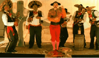 Feliz Cinco de Mayo, Sombrero band playing Mexican Hat Dance for your dancing and entertainment pleasure putting off their siesta till you finish your fiesta