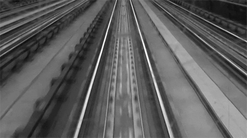 Animated view from front of a train rolling down the train tracks