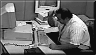 Moving animated picture man on computer pounding keyboard