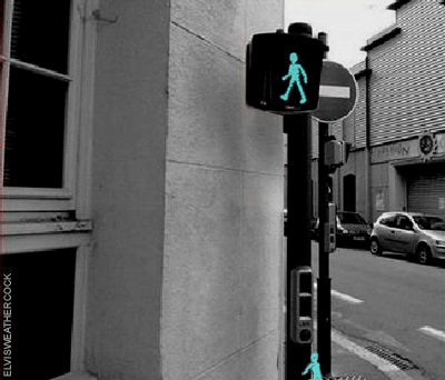 Little green walk light guy climbs up the signpost to get in his covey hole to find it is already taken by a green walk guy that goes red and knocks him down to the ground