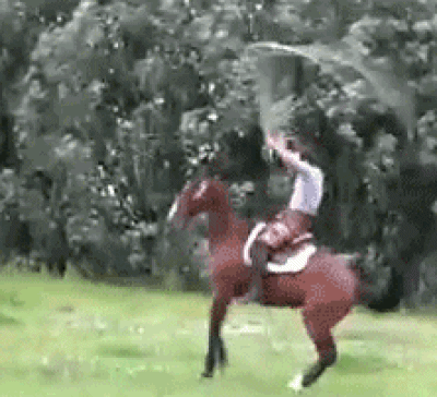 John Wayne being a show off skipping a horse