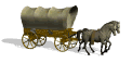 horses pulling covered wagon