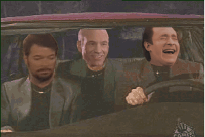 Moving gif animation of three Star Trek stars bobbing heads to "What is love" in a car on the CD