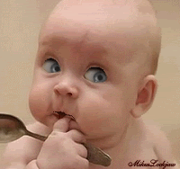 Moving animated gif picture of baby doing stuff with it's eyes 