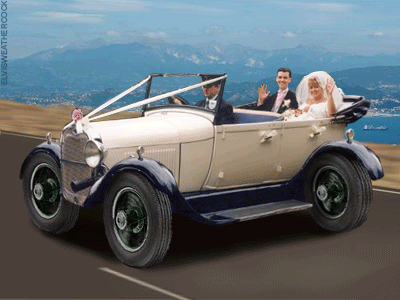 Wedding couple chauffeured in a sideways car on scenic road, Elvis Weathercock moving animated gif