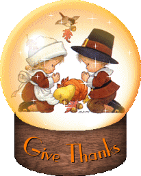 Little girl and little boy in a snow globe giving thanks for their food